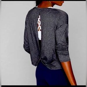 Athlete open back twist top. Size small.